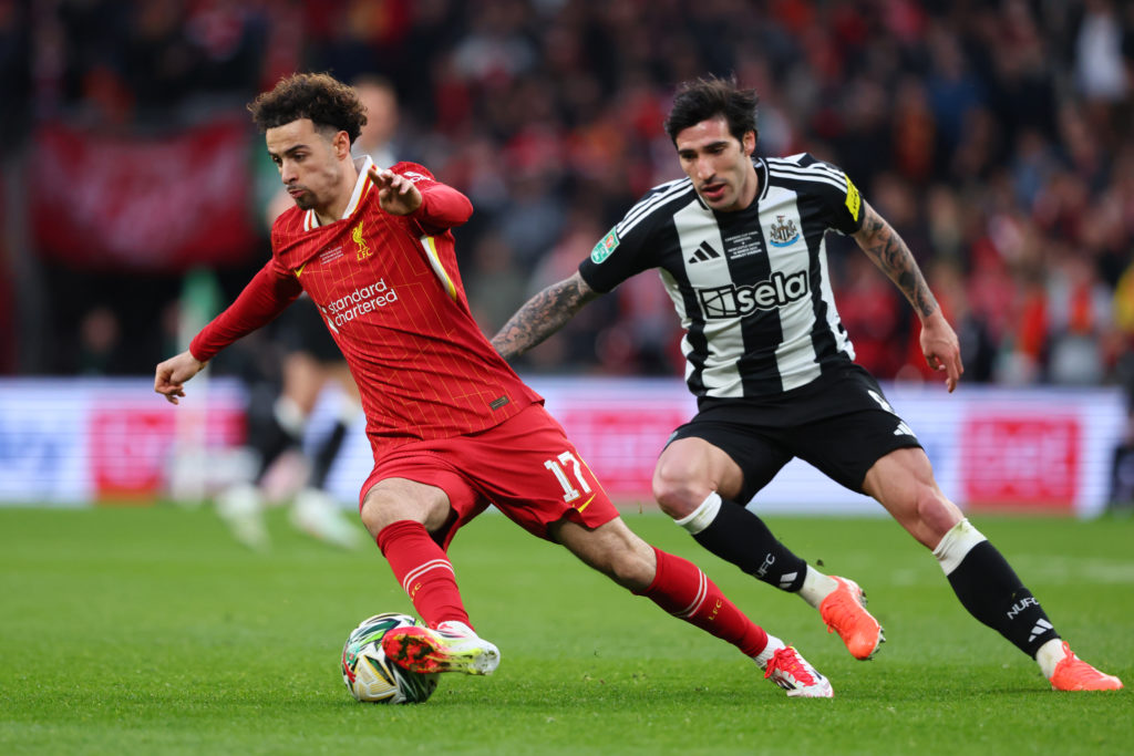 Curtis Jones of Liverpool in action with Sandro Tonali of Newcastle United during the Carabao Cup Final between Liverpool and Newcastle United at Wembley Stadium