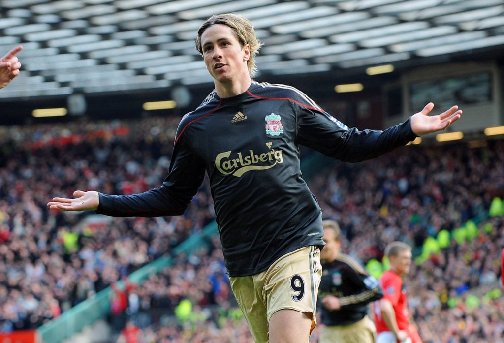Fernando Torres of Liverpool celebrates after scoring the opening goal during the Barclays Premier League match between Manchester United and Liverpool at Old Trafford