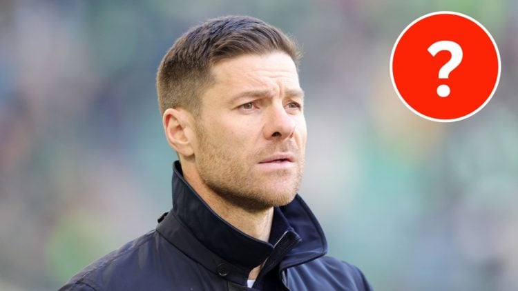 Bayer Leverkusen manager Xabi Alonso with a mystery player insert