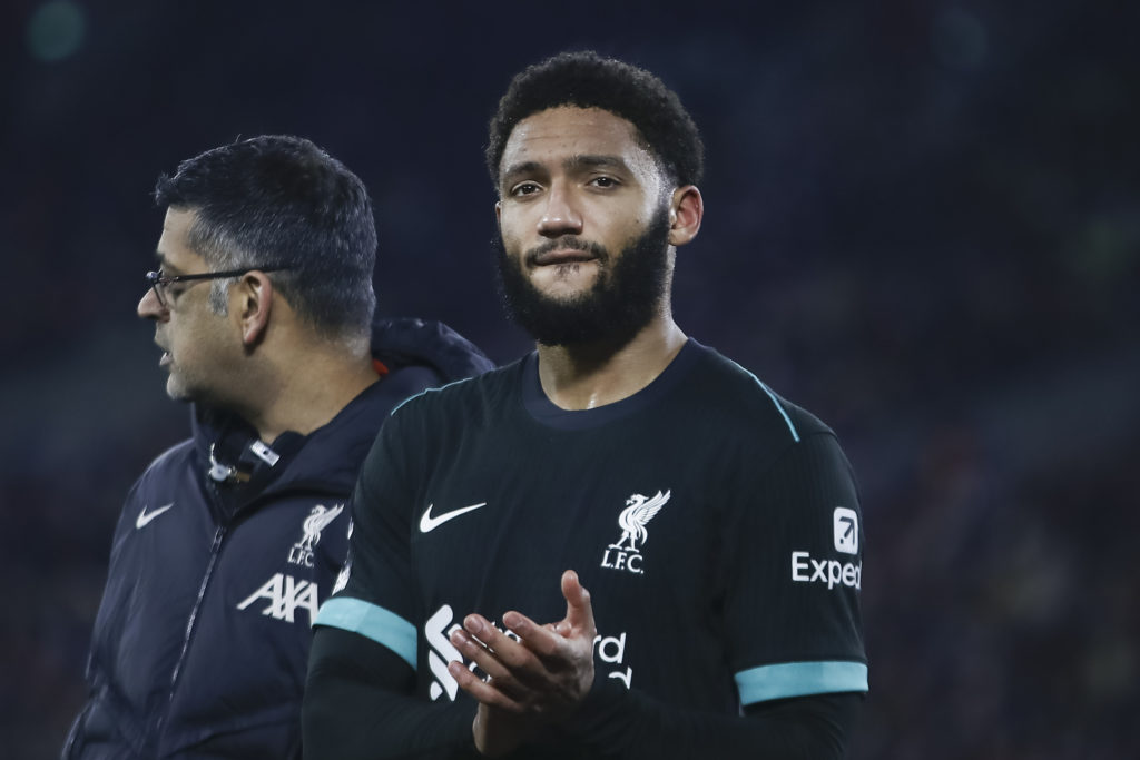 Joe Gomez of Liverpool leaves the pitch injured during the Premier League match between West Ham United and Liverpool at the London Stadium