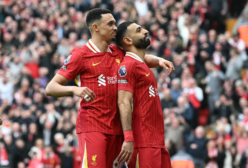 Liverpool's Egyptian striker Mohamed Salah celebrates scoring the team's second goal with Trent Alexander-Arnold during Premier League match between Liverpool and Southampton at Anfield