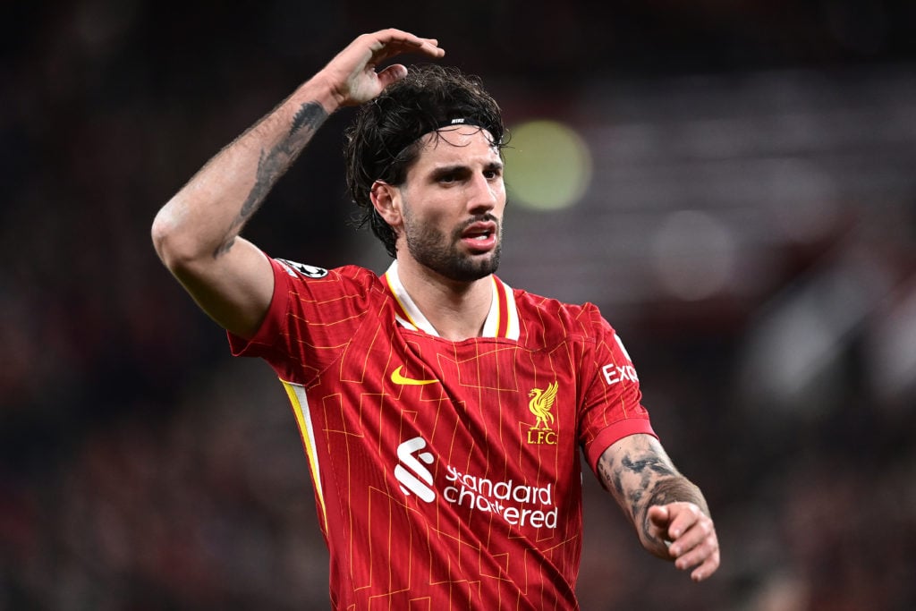 Liverpool's Dominik Szoboszlai reacts during the UEFA Champions League 2024/25 Round of 16 Second Leg match between Liverpool FC and Paris Saint-Germain