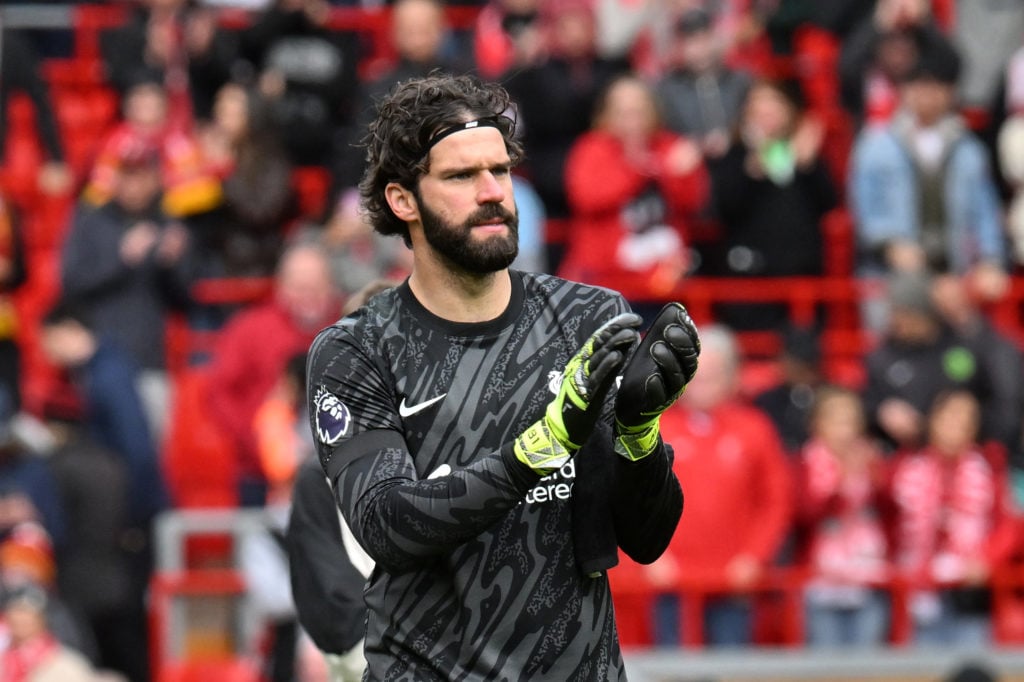 Alisson Becker of Liverpool acknowledges the fans after the Premier League match between Liverpool FC and West Ham United FC at Anfield