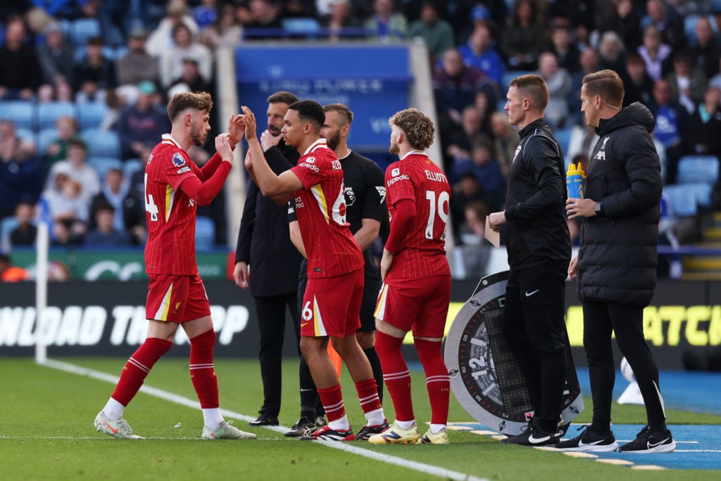 Conor Bradley comes off to be replaced by Trent Alexander-Arnold during the Premier League match between Leicester City and Liverpool at the King Power Stadium