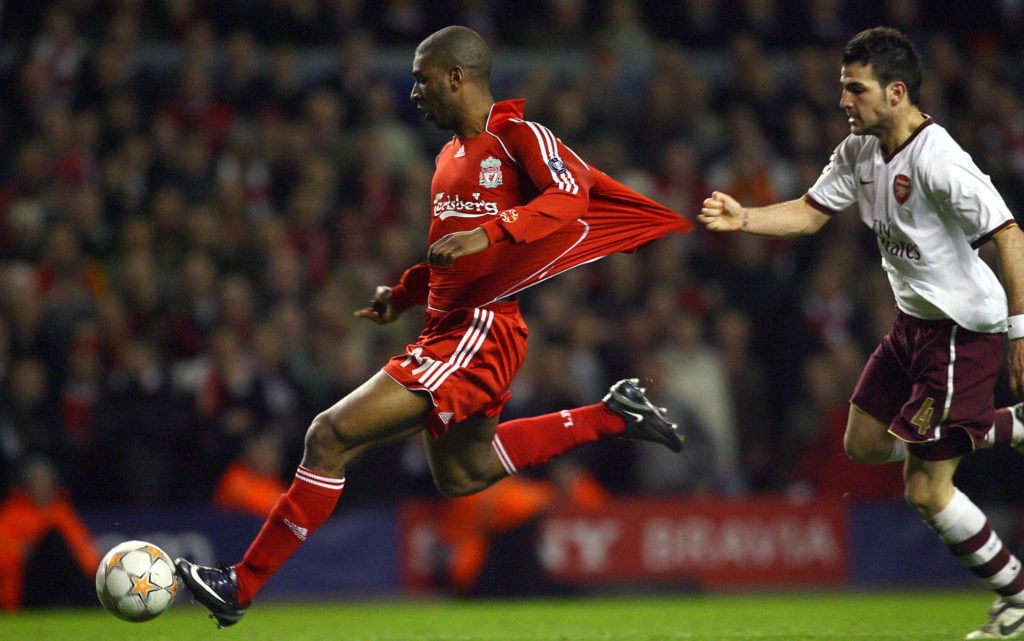 Liverpool's Dutch forward Ryan Babel (L)