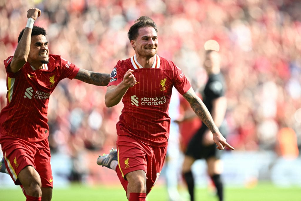 Liverpool midfielder Alexis Mac Allister celebrates with Luis Diaz after scoring against Tottenham Hotspur at Anfield.
