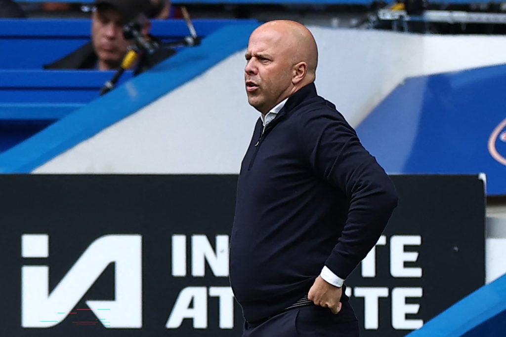 Liverpool's Dutch manager Arne Slot looks on during the English Premier League football match between Chelsea and Liverpool at Stamford Bridge
