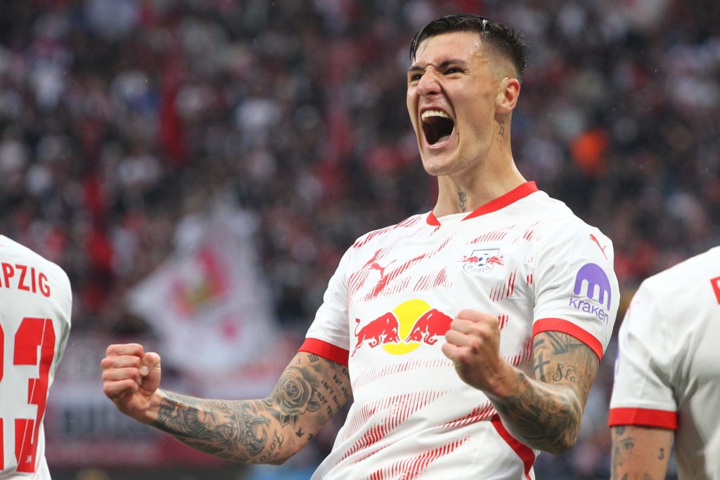 Benjamin Sesko celebrates after scoring for RB Leipzig against Bayern Munich in the Bundesliga.