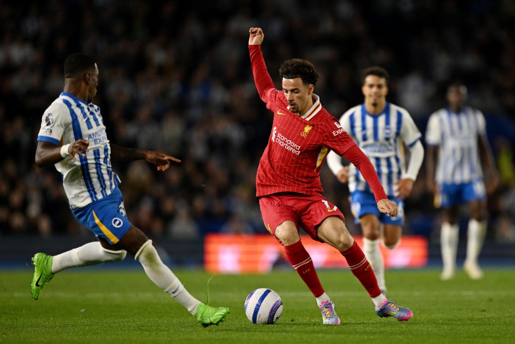 Curtis Jones pictured in action for Liverpool during their Premier League game against Brighton.
