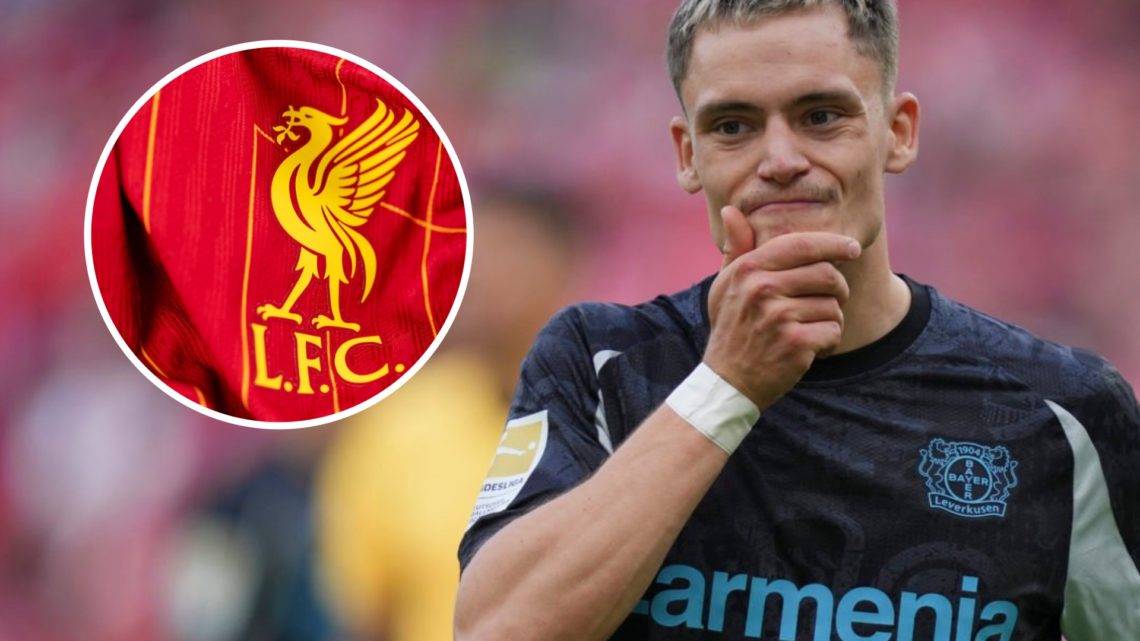 Florian Wirtz rubs his chin during Bayer Leverkusen's Bundesliga clash against FSV Mainz. Liverpool crest on the 2024/25 home shirt.