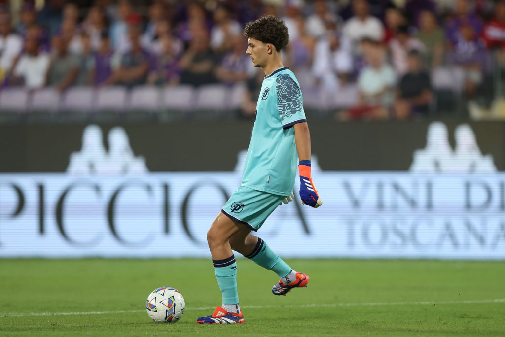 Puskas Academy goalkeeper Armin Pecsi passes the ball during the Europa Conference League play-off first-leg against Fiorentina.