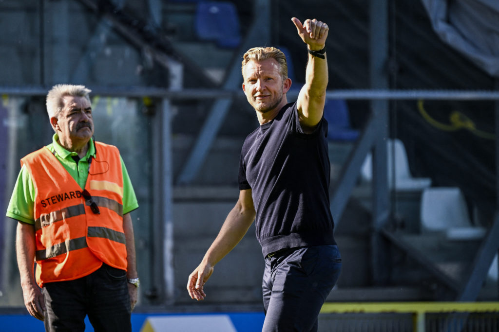Beerschot's Dutch head coach Dirk Kuyt celebrates after winning the Belgian Pro League football match between Beerschot VA and Cercle Brugge