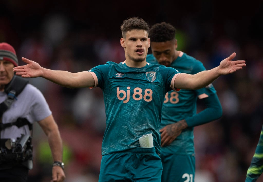 Milos Kerkez of AFC Bournemouth ackowledges the away fans after winning the Premier League match between Arsenal FC and AFC Bournemouth at Emirates Stadium