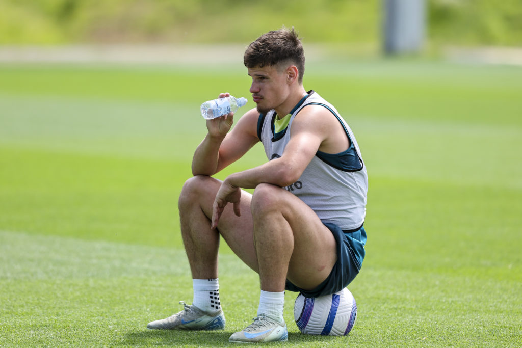 Milos Kerkez takes a water break during training with Bournemouth.