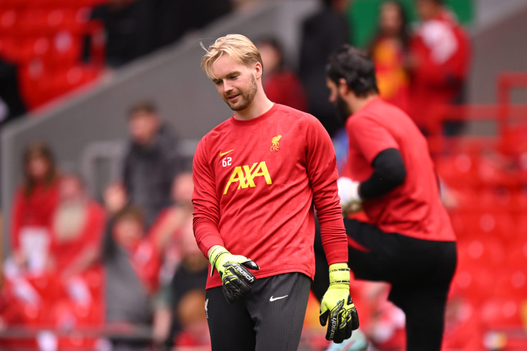 Caoimhin Kelleher pictured warming up for Liverpool.