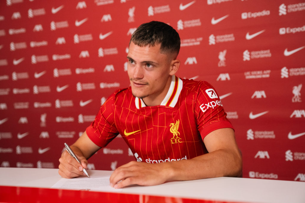 New Liverpool signing Florian Wirtz smiles as he is unveiled at the AXA Training Centre.