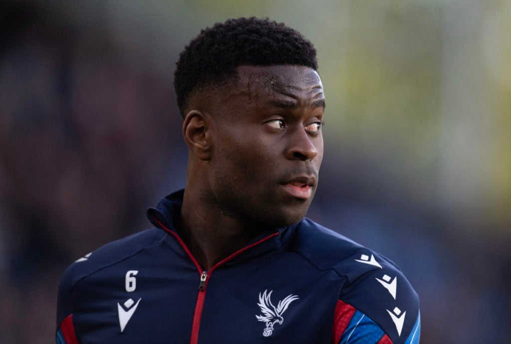 Marc Guehi of Crystal Palace warms up ahead of facing Nottingham Forest in the Premier League.