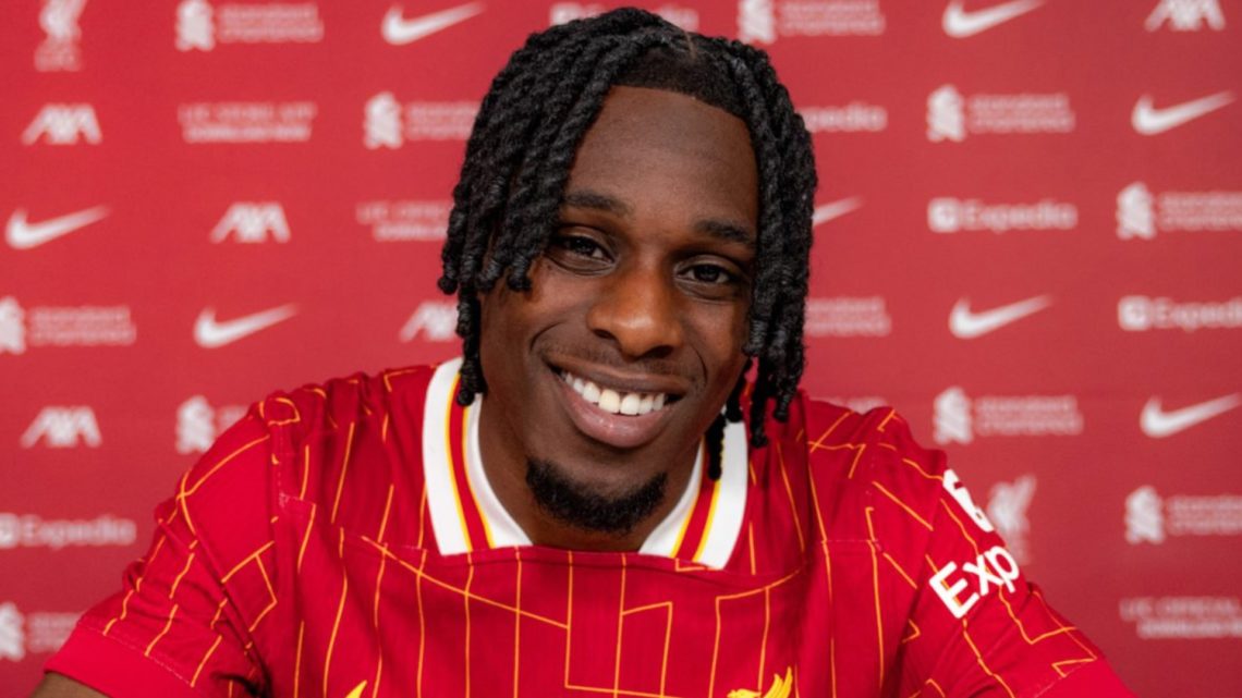 New Liverpool signing Jeremie Frimpong smiles as he is unveiled at the AXA Training Centre.