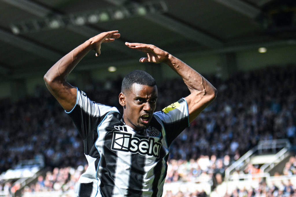 Alexander Isak gestures to the crowd at St James' Park during Newcastle United's Premier League match against Everton.