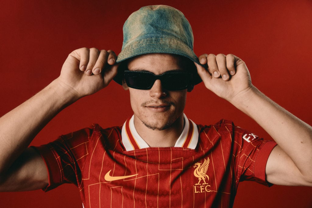 New Liverpool signing Florian Wirtz poses in a bucket hat and sunglasses after being unveiled at the AXA Training Centre.