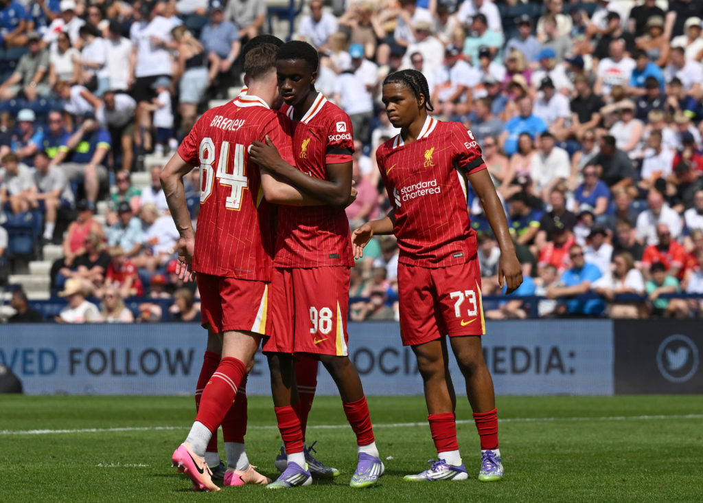 Liverpool players Trey Nyoni, Rio Ngumoha celebrate with Conor Bradley after he scored against Preston in a pre-season friendly at Deepdale.