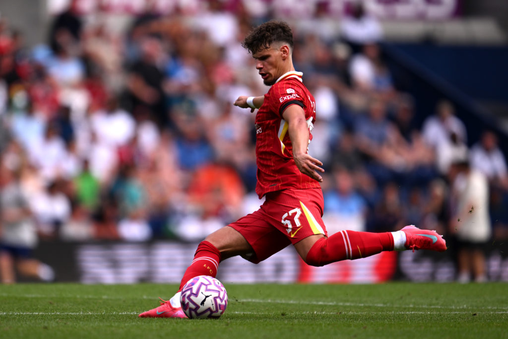 Milos Kerkez of Liverpool passes the ball during the pre-season friendly match between Preston North End and Liverpool at Deepdale