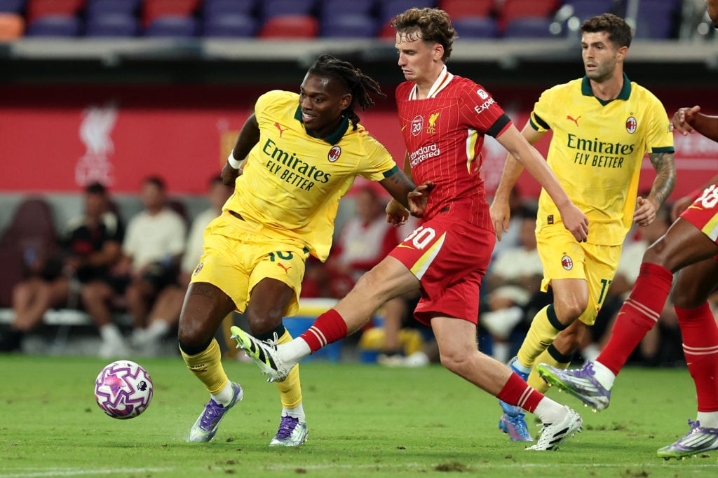Rafael Leao of Milan competes for the ball with Tyler Morton the Pre-Season Friendly match between Liverpool FC and AC Milan at Kai Tak Sports Park