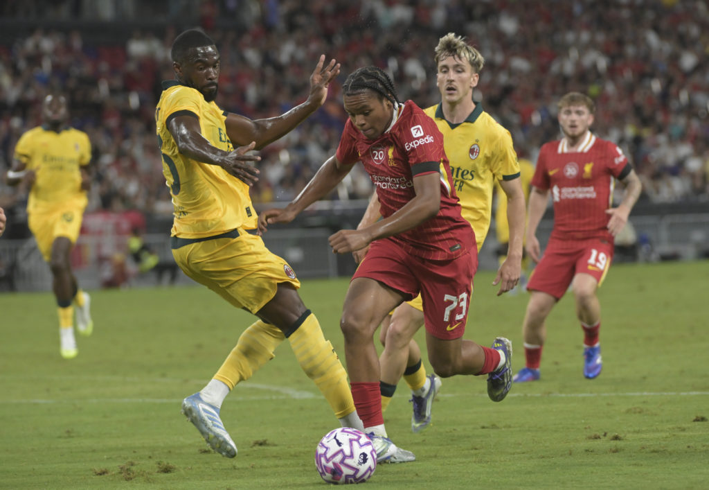 Fikayo Tomori of AC Milan competes for the ball with Rio Ngumoha of Liverpool FC during the Pre-Season Friendly match between Liverpool FC an AC Milan at Kai Tak Sports Park