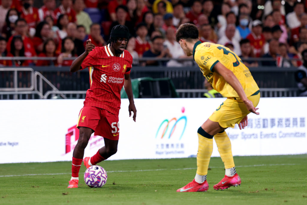 Jeremie Frimpong takes on Davide Bartesaghi of AC Milan during Liverpool's pre-season friendly in Hong Kong.