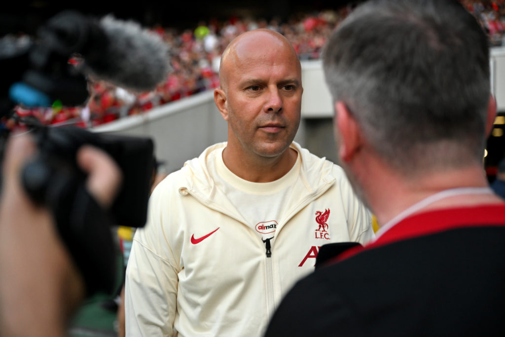 Arne Slot being interviewed on the touchline before Liverpool's pre-season match against Yokohama F. Marinos.