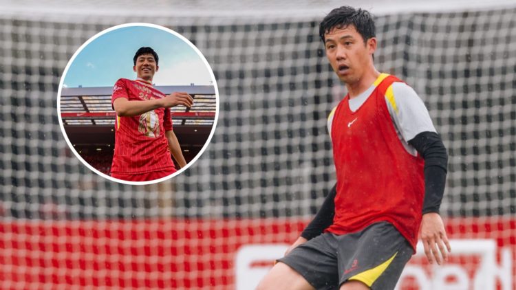 Wataru Endo passes the ball during a pre-season training session with Liverpool. Wataru Endo smiles in front of the Kop as he celebrates winning th...