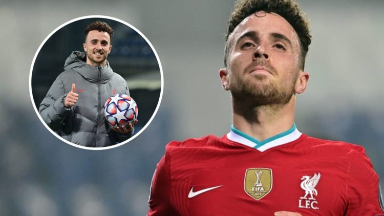 Liverpool striker Diogo Jota celebrates after scoring against Atalanta in the UEFA Champions League. Liverpool striker Diogo Jota smiles with the m...