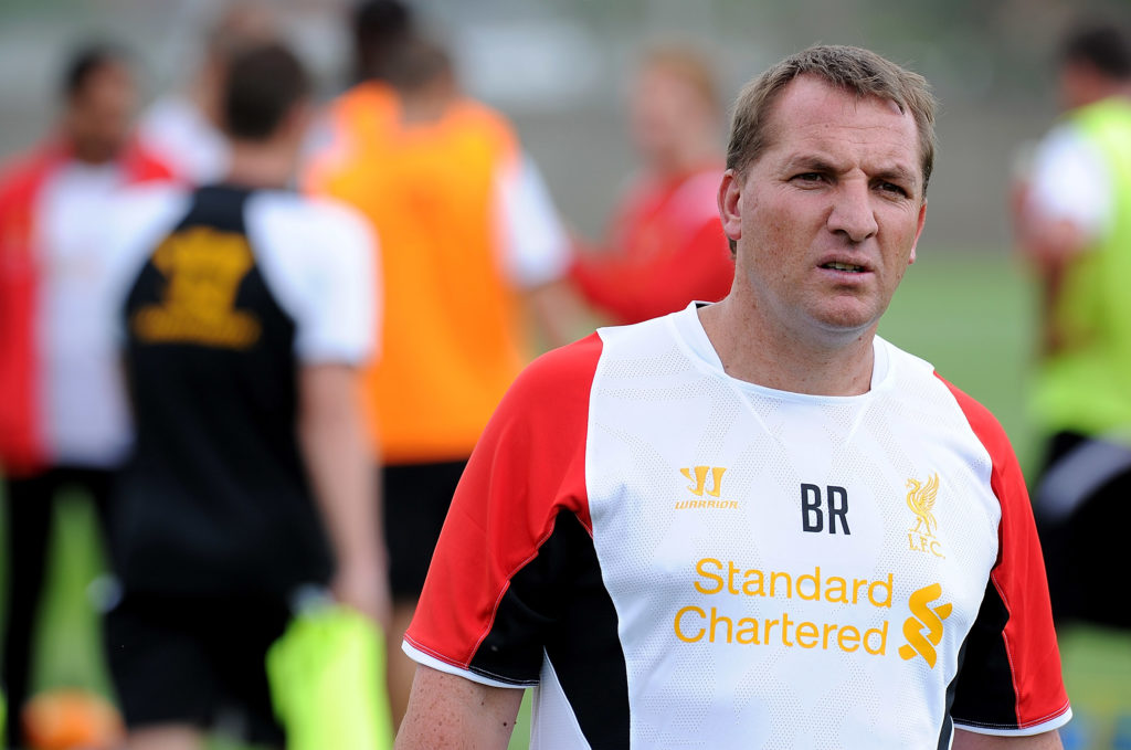 Brendan Rodgers of Liverpool in action during a training session at Melwood Training Ground