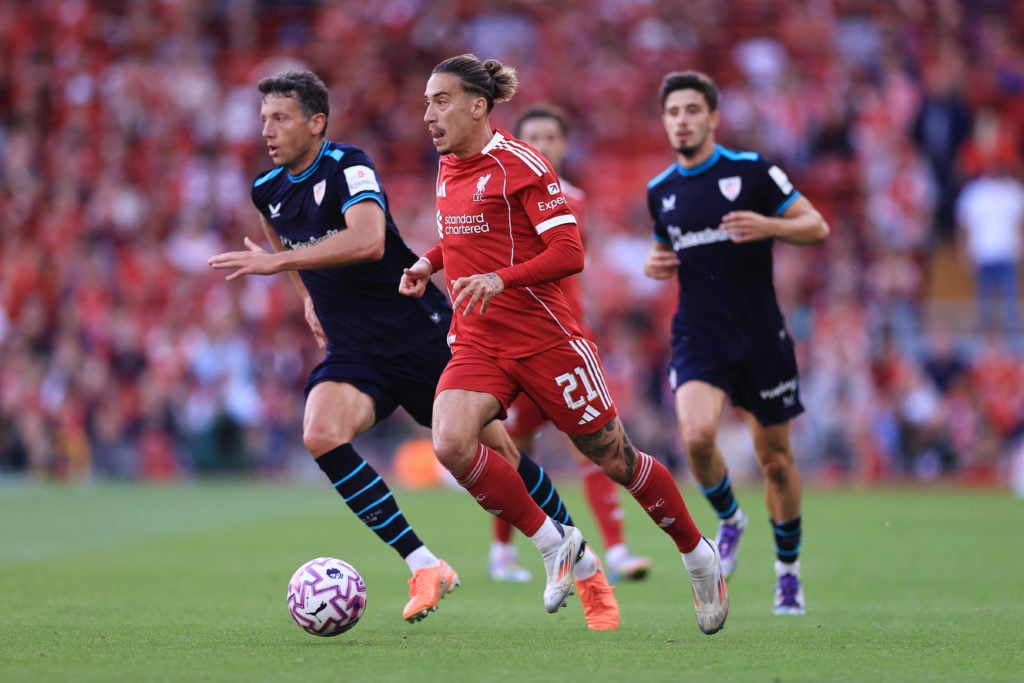 Kostas Tsimikas runs with the ball during Liverpool's pre-season friendly against Athletic Bilbao at Anfield