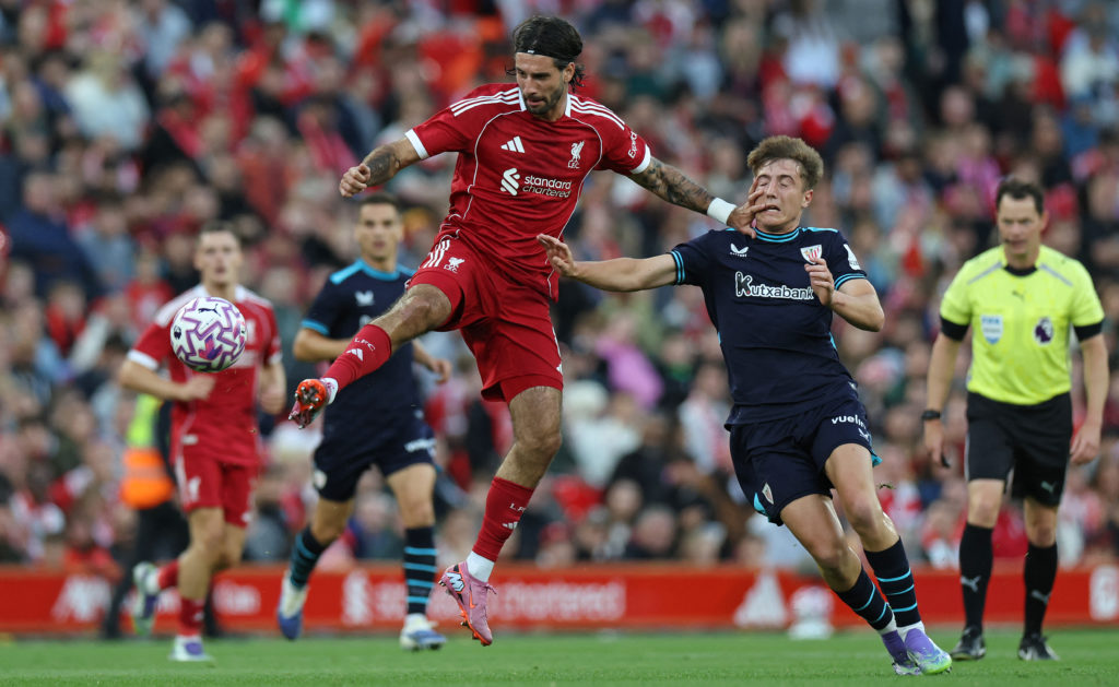 Dominik Szoboszlai challenges for the ball during Liverpool's pre-season match against Athletic Bilbao at Anfield.