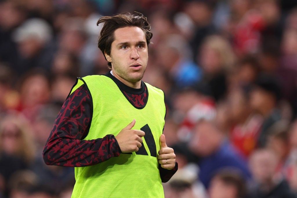 Liverpool attacker Federico Chiesa warming up for their game against Athletic Club.