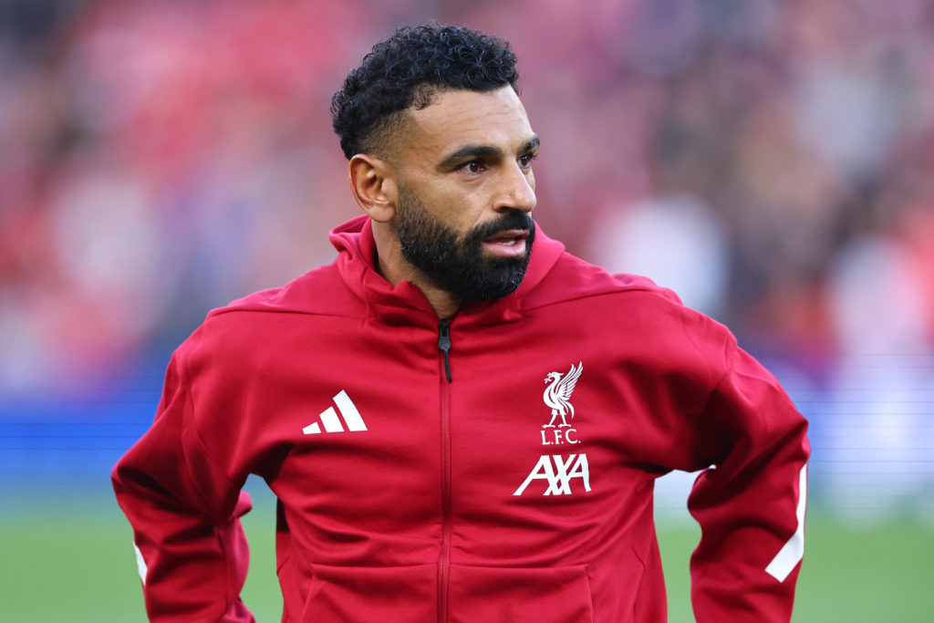 Mohamed Salah warms up ahead of Liverpool's pre-season match against Athletic Bilbao at Anfield,.