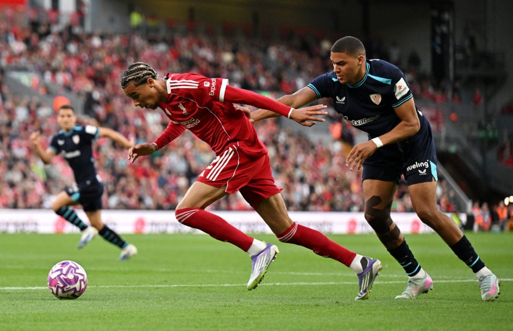 Hugo Ekitike of Liverpool is challenged by Maroan Sannadi of Athletic Club Bilbao during the second pre-season friendly match between Liverpool and Athletic Club Bilbao at Anfield on