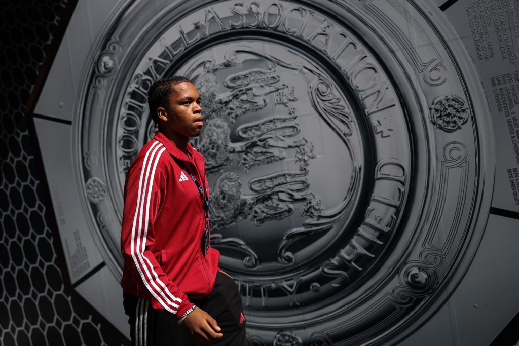 Rio Ngumoha walks out for Liverpool ahead of the Community Shield at Wembley Stadium