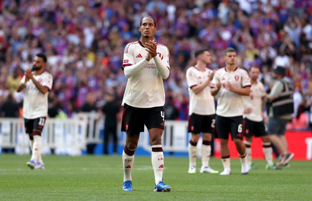 Liverpool captain Virgil van Dijk applauds fans at Wembley Stadium after the 2025 Community Shield