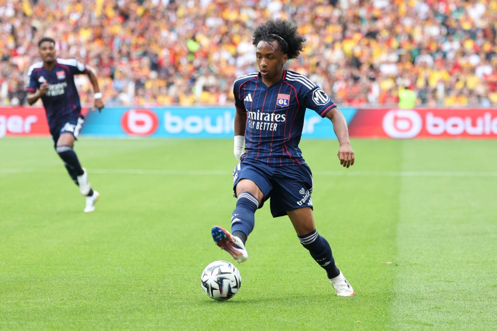 Malick Fofana passes the ball during Lyon's Ligue 1 match against Lens.