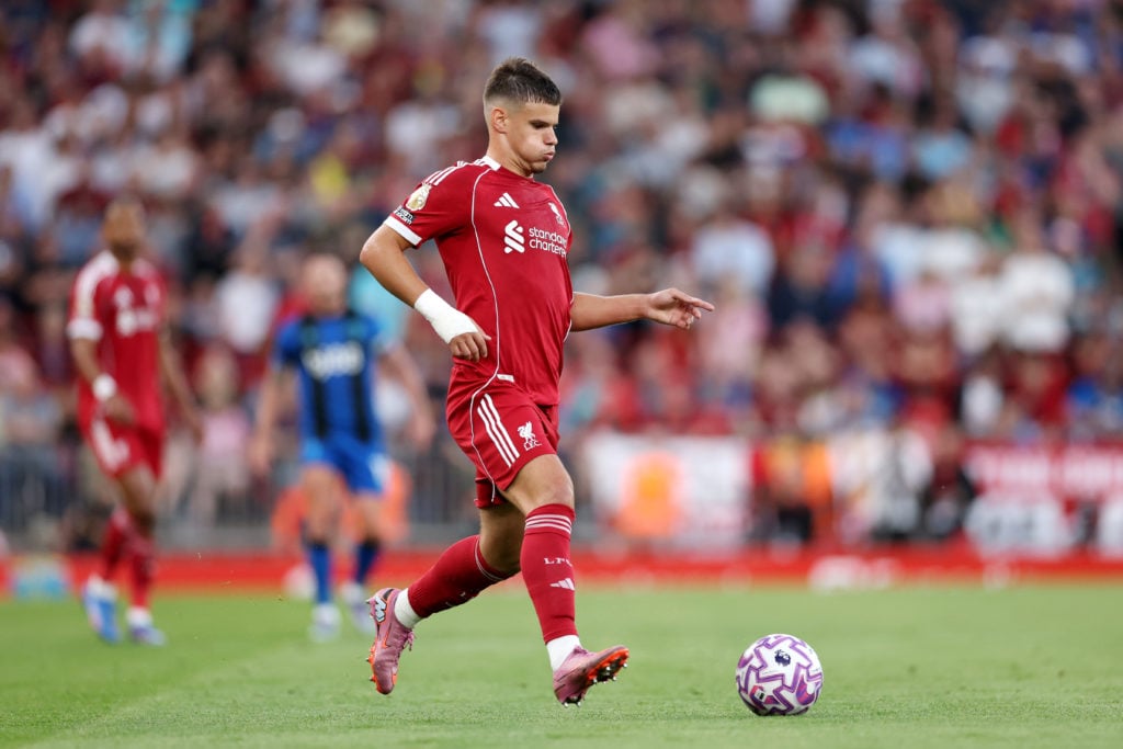 Milos Kerkez of Liverpool runs with the ball during the Premier League match between Liverpool and Bournemouth at Anfield
