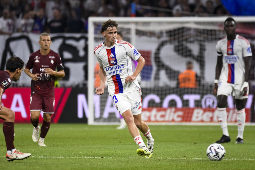 Tyler Morton passes the ball during Lyon's Ligue 1 match against Metz at the Groupama Stadium