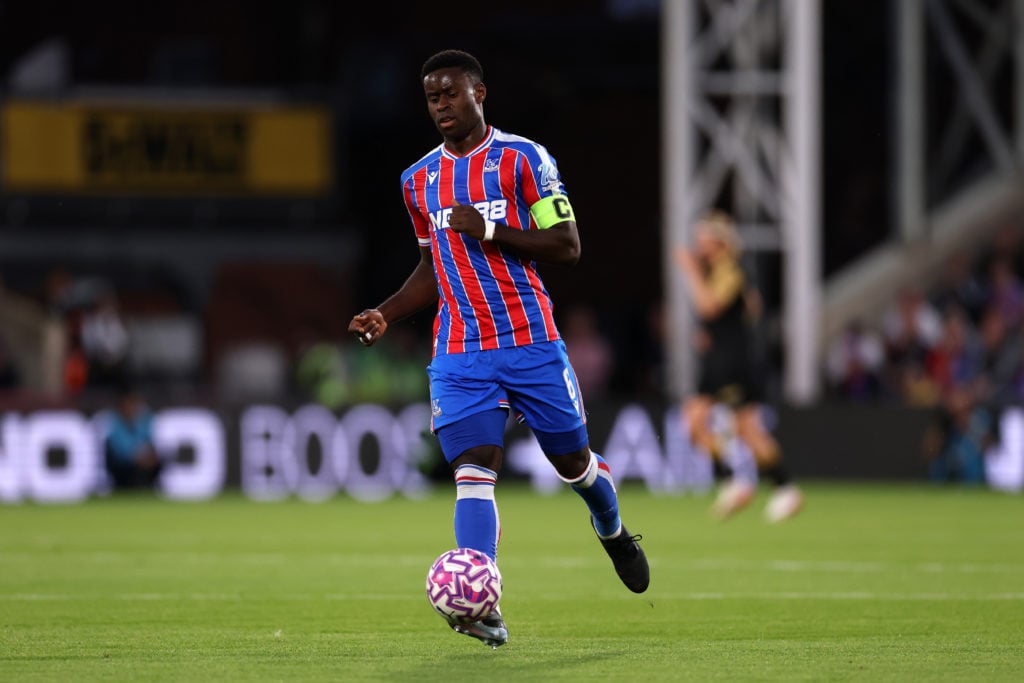 Marc Guehi passes the ball during Crystal Palace's UEFA Europa Conference League qualifier against Fredrikstad at Selhurst Park.
