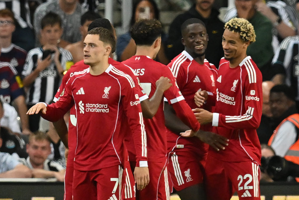 Hugo Ekitike celebrates with his Liverpool teammates after scoring against Newcastle United in the Premier League at St James' Park.