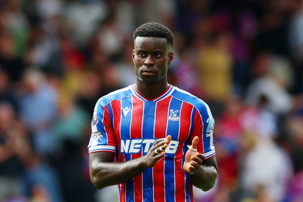Marc Guehi applauds fans after Crystal Palace's Premier League match against Nottingham Forest at Selhurst Park.