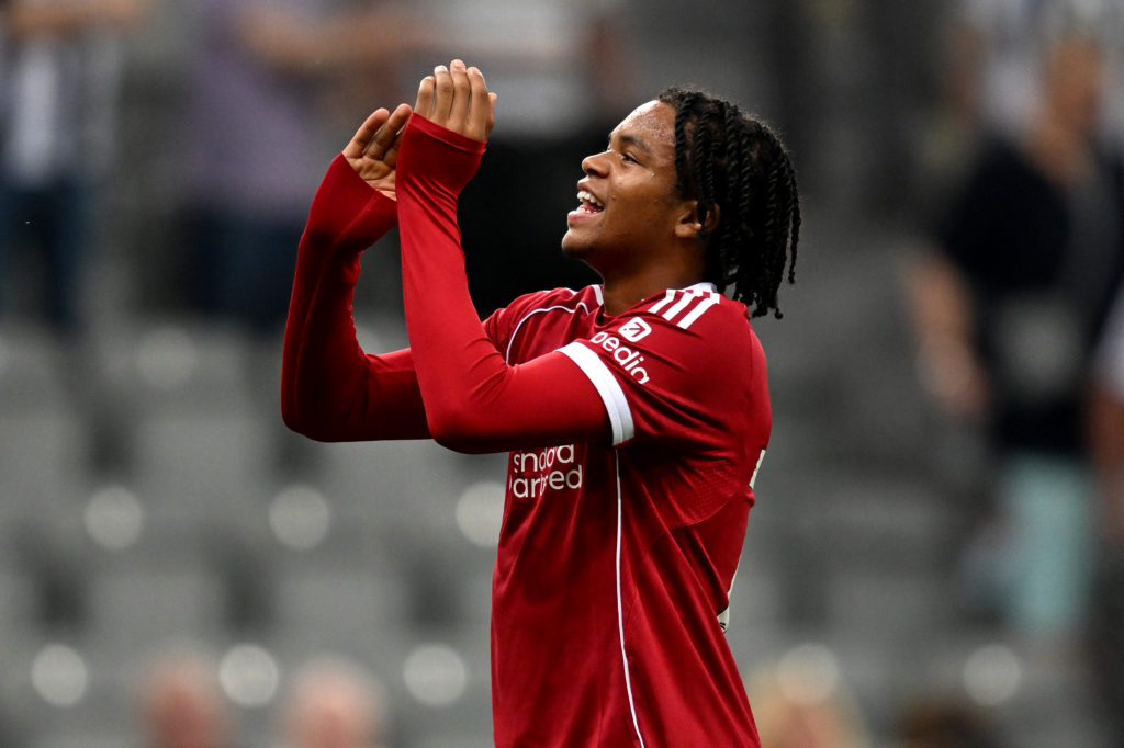 Rio Ngumoha of Liverpool applauds the fans at full-time following the team's victory in the Premier League match between Newcastle United and Liverpool at St James' Park