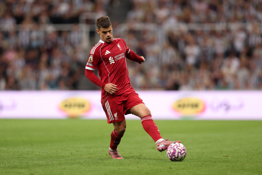 Milos Kerkez of Liverpool passes the ball during the Premier League match between Newcastle United and Liverpool at St James' Park
