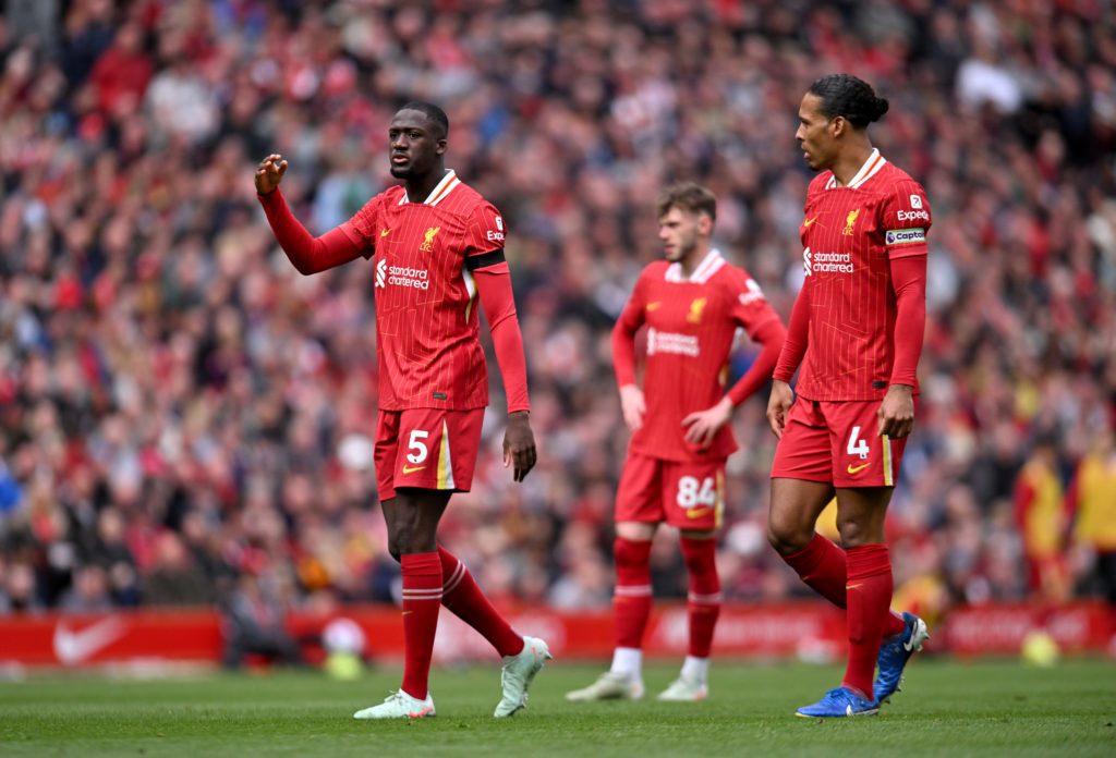 Virgil van Dijk and Ibrahima Konate speak during West Ham game