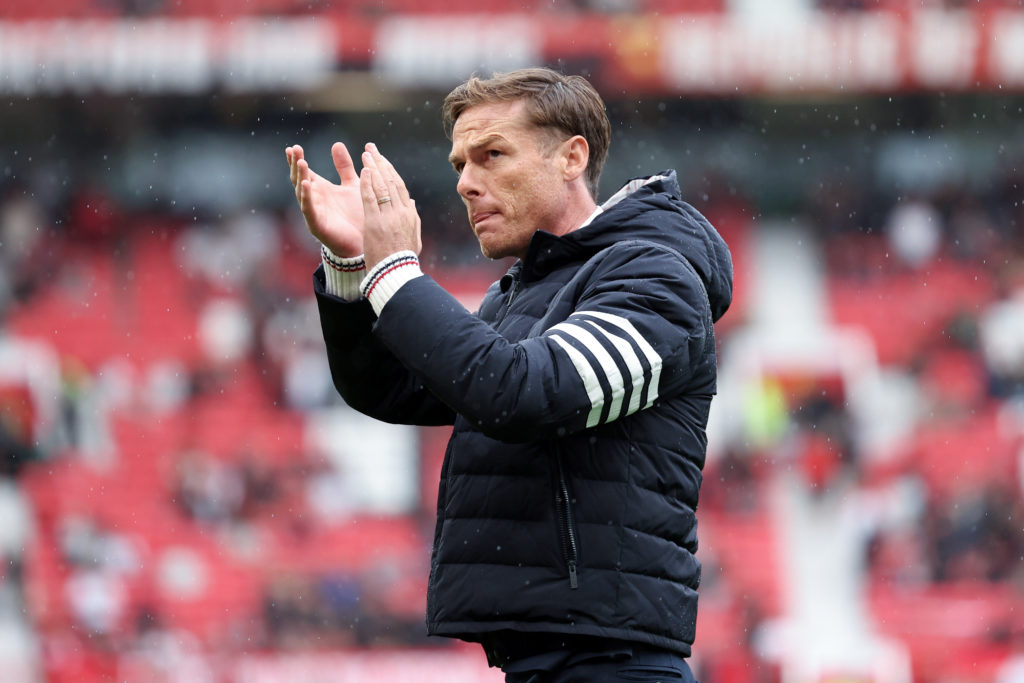 Scott Parker, Manager of Burnley, acknowledges the fans after the Premier League match between Manchester United and Burnley at Old Trafford.